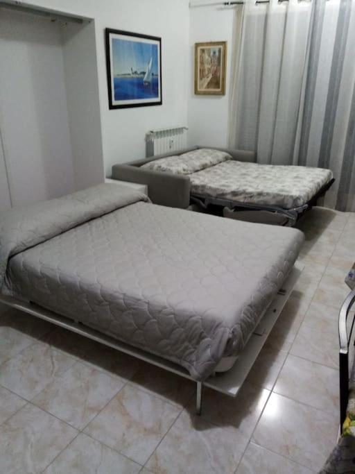 Apartamento Ampio Monolocale Con Terrazzo - A 2 Passi Dal Mare Latte Exterior foto
